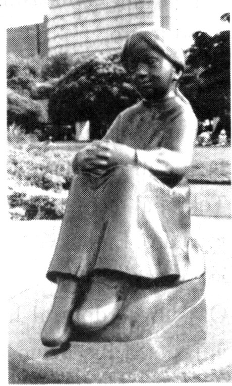la statuo de la knabino kun ruĝaj ŝuoj